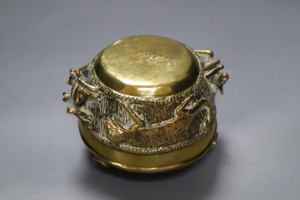 A set of three Victorian papier mache snuff boots, 8cm, a bank nameplate and ornamental brassware (8)